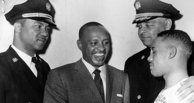 Two black police officers with African-American jazz musician and actor Lionel Hampton in 1957. Photograph:  Afro American Newspapers/Gado/Getty Images)