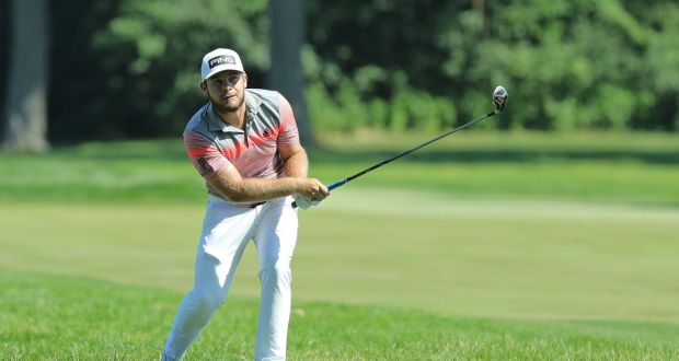 Tyrrell Hatton  plays a shot during the final round of the Rocket Mortgage Classic at Detroit Golf Club. Photograph: Leon Halip/Getty Images