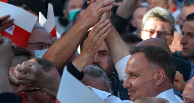 Polish president Andrzej Duda, a vocal supporter of the populist PiS Law and Justice Party greets supporters in Lomza, central Poland. Since the president can veto legislation there is more at stake in this election than the domestic and international projection of a figurehead. Photograph: Getty Images