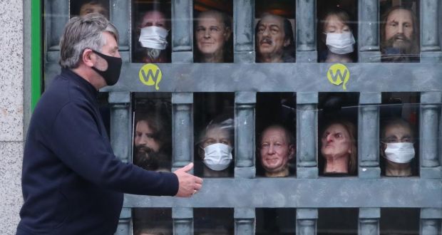 A man walks past a window display at the National Wax Museum Plus in Dublin, which has reopened following the easing of lockdown restrictions. Photograph: Niall Carson/PA Wire