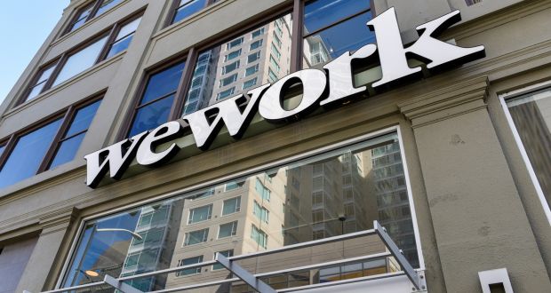 A WeWork logo is seen outside its offices in San Francisco. Photograph: REUTERS/Kate Munsch/File Photo
