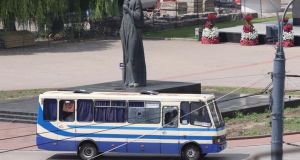 The bus with hostages on a road in the downtown of  Lutsk on July 21st. Photograph: Nikolay Martynyuk/EPA