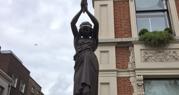 One of the statues  depicting slave girls holding torches. Photograph: Wikimedia Commons 
