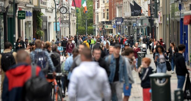 Crowds make their way along Grafton Street in busier times but In the absence to date of a vaccine or effective treatment for Covid-19, the recovery for  the street and other city centre retailers has been sluggish. Photograph: Dara Mac Dónaill 
