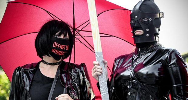 Members of sex workers’ organisations at a protest to demand an end to the prohibition to work due to the coronavirus crisis, in Cologne. Photograph: Sascha Steinbach/EPA