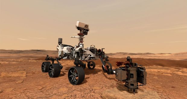A Nasa illustration show its Mars 2020 rover as it uses its drill to core a rock sample on Mars. Photograph: Handout/ Nasa/JPL-Caltech/ AFP via Getty Images