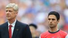 Arsenal manager Arsene Wenger and captain Mikel Arteta pictured before the FA Cup final in 2014. Photograph: Nick Potts/PA Wire