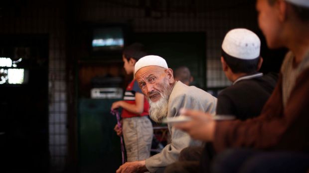 UIghur men at an eatery in a market bazaar in the city of Hotan, China. File photograph: Elizabeth Dalziel/AP Photo