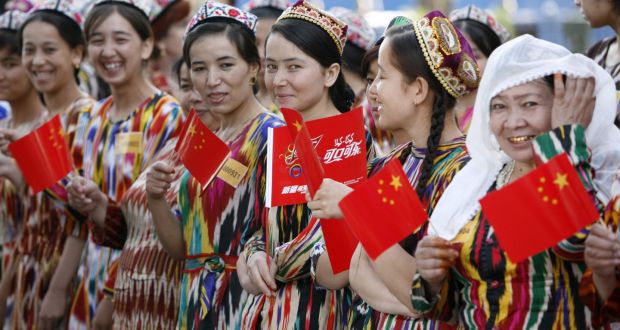 Women in traditional Uighur clothes  in Kashgar, Xinjiang province. File photograph: Reinhard Krause/Reuters