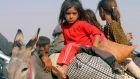 Displaced children from the minority Yazidi sect, fleeing violence from forces loyal to the Islamic State. “Many child survivors have returned from captivity with debilitating long-term injuries, illnesses or physical impairments,” according to an Amnesty report. Photograph: Rodi Said/Reuters