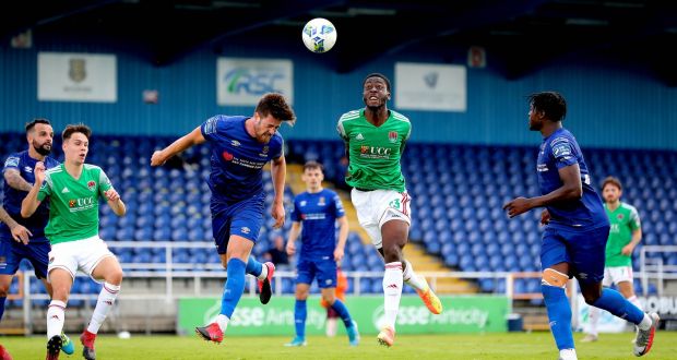 Waterford’s Sam Bone and Cork City’s Joseph Olowu challenge for the ball at the RSC. Photograph: Ryan Byrne/Inpho