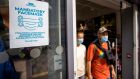Sign advising customers at Trespass store in Belfast that the wearing of face masks is mandatory. Photograph: Liam McBurney/PA Wire