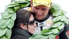 Michael Dunlop is comforted on the podium by his girlfriend Jill after winning the 250cc race at the North West 200 just two days after his father Robert was killed during practice for the same race. Photo: Stephen Davison/Pacemaker