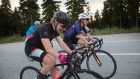 Morgan Cabot, as she nears completion of the Everesting challenge of cycling the equivalent of Mt Everest’s altitude on Mount Seymour in Vancouver, Canada. Photograph: Alec Jacobson/New York Times