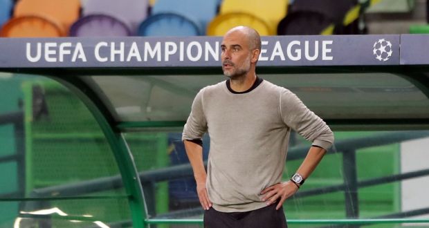  Pep Guardiola watches his Manchester City team crash out of the Champions League in Lisbon. Photograph: EPA