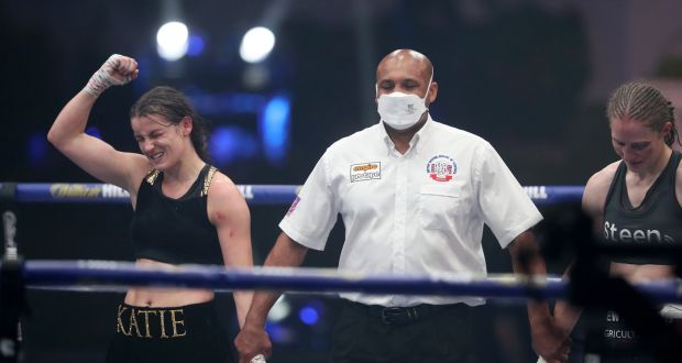 Katie Taylor celebrates her win against Delfine Persoon on Saturday night. Photograph: PA