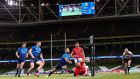 Munster’s Keith Earls gets over in the corner for a try during the Guinness Pro 14 game against Leinster at the  Aviva Stadium. Photograph: Billy Stickland/Inpho