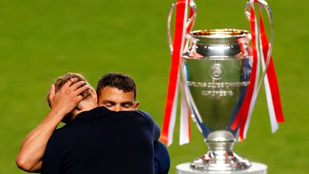 Thiago Silva is consoled by Thomas Tuchel following PSG’s defeat to Bayern Munich. Photograph: Matthew Childs/Getty/AFP
