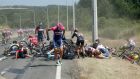 Riders collecting  themselves after a crash during a stage  of the  Tour de France. Photograph: Doug Pensinger/Getty Images