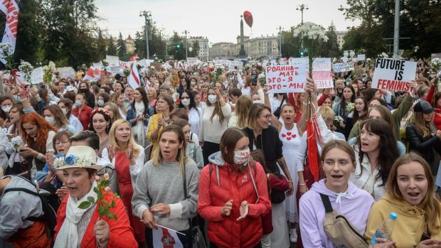 Belarus women attend a protest march against the results of the presidential elections. Photograph: EPA