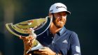 Dustin Johnson  celebrates with the FedEx Cup Trophy after winning  the Tour Championship at East Lake Golf Club  in Atlanta, Georgia. Photograph: Sam Greenwood/Getty Images