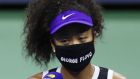 Japan’s  Naomi Osaka  wearing a mask with the name of George Floyd on it during an interview following her  quarter-final  win against Shelby Rogers of the United States at the US Open. Photograph:   Matthew Stockman/Getty Images