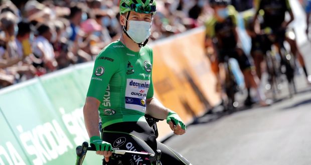 Ireland’s Sam Bennett, wearing the sprinters green jersey, waits for the start of the stage 13 of the Tour de France. 