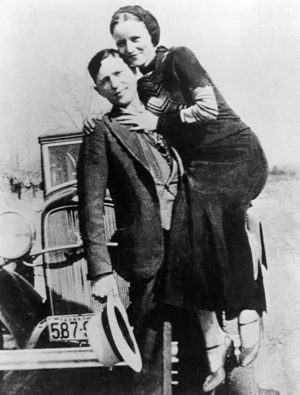 Portrait of American bank robbers and lovers Clyde Barrow (1909-1934) and Bonnie Parker (1911-1934), popularly known as Bonnie and Clyde, circa 1933. Photograph: Hulton Archive/Getty