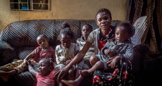 Congolese refugee Riziki Kwabo, 36, says it’s been hard taking care of five young children who are all out of school. Now, they also risk eviction. Photograph: Sally Hayden 
