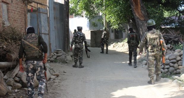 Indian security personnel patrolling during an operation in a village in the north of Kashmir in July 2019. Photograph: Getty Images