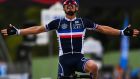 Julian Alaphilippe celebrates as he crosses the finish line to win the Men’s Elite Road Race in  Emilia-Romagna, Italy, on Sunday. Photograph: Marco Bertorello/AFP via Getty Images
