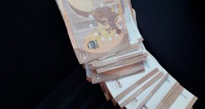 Some of the €12,600 in cash that was seized during searches of four properties in Listowel, Co Kerry.  