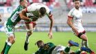 Ulster’s Sam Carter is tackled by Dewaldt Duvenage of Benetton during the Guinness Pro 14 game at the  Kingspan Stadium. Photograph: Laszlo Geczo/Inpho