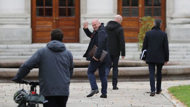 Dr Tony Holohan waves to leader of the Green Party Eamon Ryan as they arrive at Government Buildings on Monday afternoon. Photograph: Nick Bradshaw/The Irish Times.