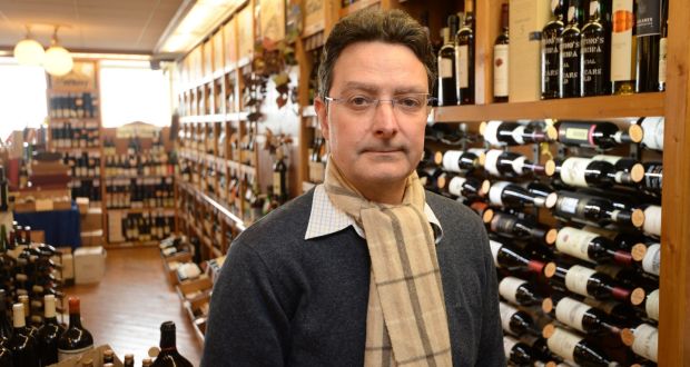 Joël Durand, owner of Blackrock Cellar off-licence in Dublin, has already reduced his opening hours, and now closes at 8pm instead of 10pm, because ‘there is no business after 8pm’. Photograph:  Dara Mac Donaill 