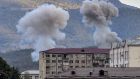  Smoke rises after shelling in Stepanakert  during fighting between Armenia and Azerbaijan over the disputed region of Nagorno-Karabakh. Photograph: Aris Messinis