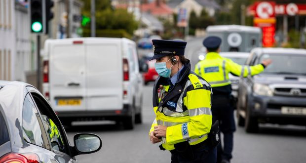 Gardaí perform random vehicle checks in the village of Muff, Co Donegal, on the Border with Northern Ireland.  Photograph: Liam McBurney/PA Wire