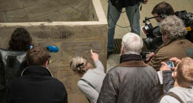 Friederike Seyfried, director of the Egyptian collection of the Neues Museum in Berlin, points to the damage caused to exhibits. Photograph:  Stefanie Loos/AFP via Getty Images