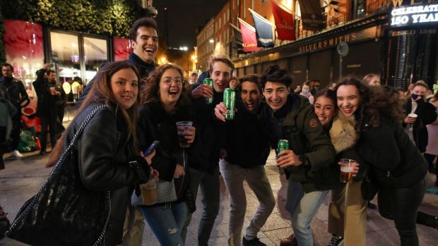People on Grafton Street, Dublin for some last minute socialising on Wednesday night. Photograph by Crispin Rodwell