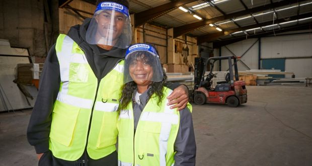 Manchester United striker Marcus Rashford visiting FareShare Greater Manchester at New Smithfield Market with his mother. Photograph: Fareshare/Mark Waugh/PA Wire 