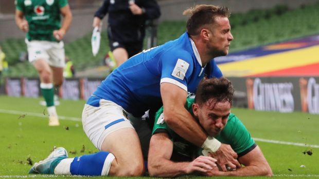 Hugo Keenan scores his second try on his international debut against Italy. Photograph: Brian Lawless/EPA