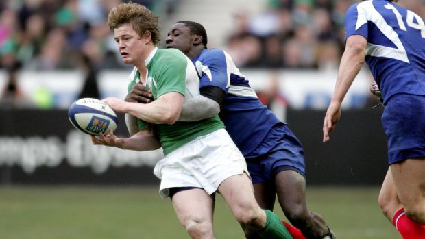 Ireland’s Brian O’Driscoll is tackled by Yannick Nyanga of France during the 2006 Six Nations match at the Stade de France. Photograph: Andrew Paton/Inpho