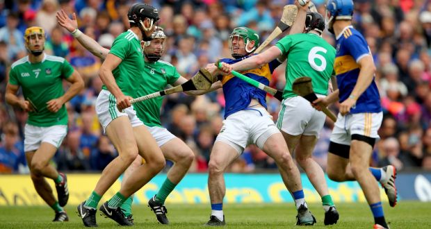 Limerick’s Gearóid Hegarty, Cian Lynch and Declan Hannon tackle John O’Dwyer of Tipperary in last year’s Munster final. Tipperary will have to do a lot better in the middle third if they are to prevail on Sunday.  Photograph: James Crombie/Inpho 