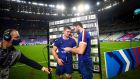 France’s Gregory Alldritt is presented with the Six Nations Player of the Match award by his captain Charles Ollivon. Photograph: Inpho