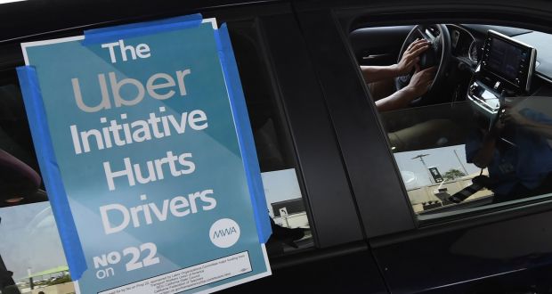 Voters in California backed a ballot proposal by Uber, Lyft and its allies that cements app-based food delivery and ride-hailing drivers’ status as independent contractors. Photograph: Robyn Beck/AFP