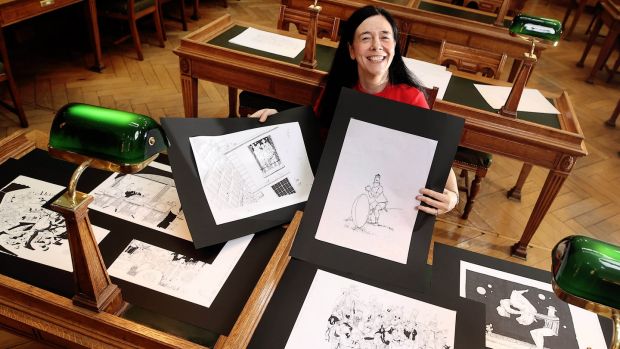 Sandra Collins, director of the National Library of Ireland, with items from the Ross O’Carroll-Kelly collection. Photograph: Marc O’Sullivan