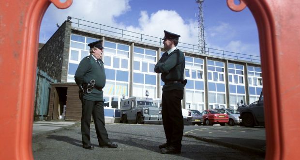 Police officers standing guard outside Castlereagh police station in east Belfast in 2002. Photograph: Paul McErlane/Reuters