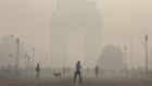 Commuters in New Delhi’s heavy smog. Photograph: Rajat Gupta/EPA