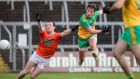 Donegal’s Peadar Mogan scores a goal despite the efforts of Armagh’s Ryan Kennedy of Armagh in the Ulster semi-final at Kingspan Breffni Park. Photograph: Inpho