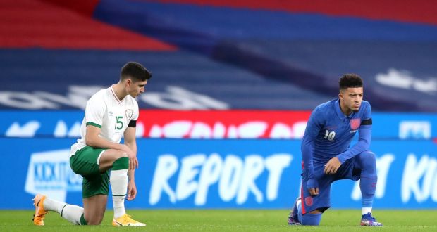 Republic of Ireland football player Callum O’Dowda and England’s Jadon Sancho take a knee in support of the Black Lives Matter movement before their international friendly at Wembley Stadium, London last Friday. Photograph: Nick Potts/PA Wire
